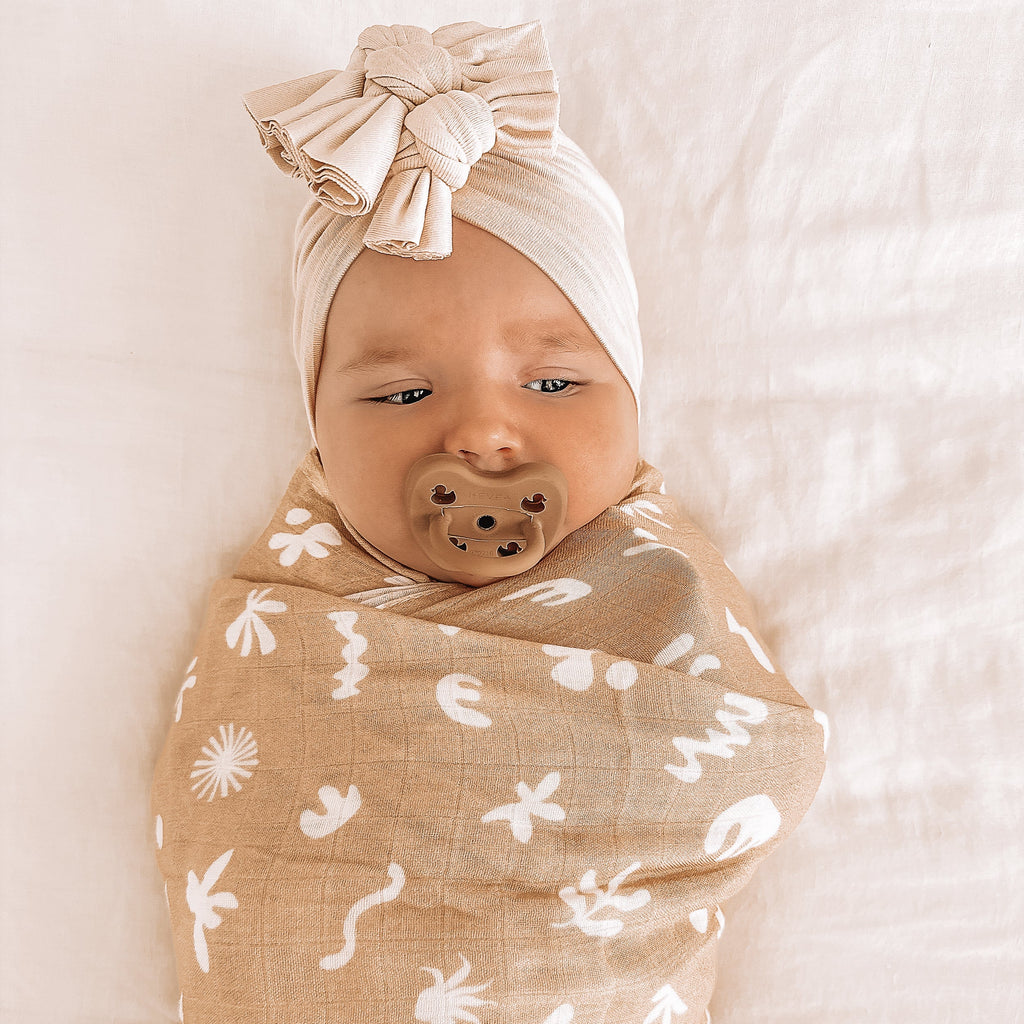 MWRAP22-FrescoSwaddle-LikedByLeo-1-square.jpg